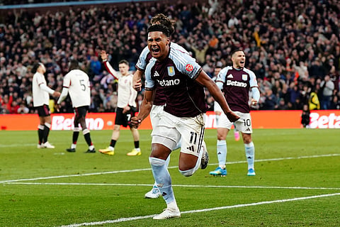 Aston Villa's Ollie Watkins celebrates scoring their side's third goal during the English Premier League soccer match between Aston Villa and Liverpool in Birmingham, England, Friday, May 15, 2026.