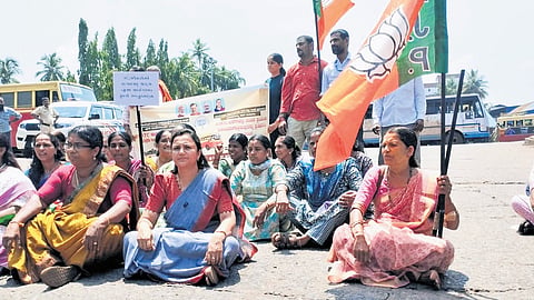 Mahila Morcha members staging a sit-in at the KSRTC bus station in Kasaragod.