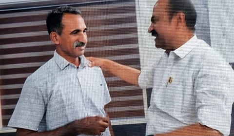Antony M John with V D Satheesan in Pala last month.