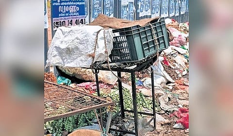 Garbage heap on the premises of Aluva Market.
