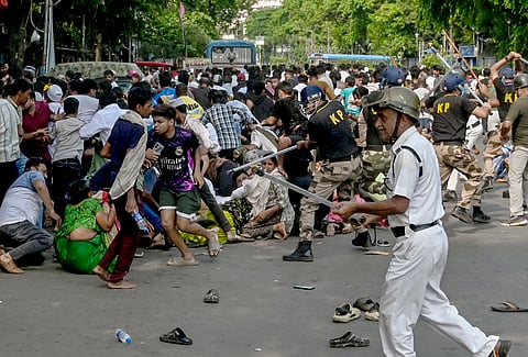Police lathicharge protestors during protest against a recent demolition drive at Tijala area among other issues, at Park Circus area, in Kolkata, Sunday, May 17, 2026.
