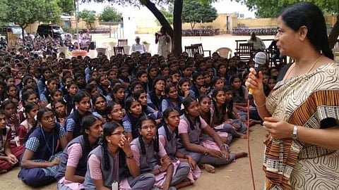 S Vijayarani Meenakshi interacts with students of a government-aided Girls Higher Secondary School in Dhalavaipuram during an awareness programme on menstruation, gender stereotypes and empathy.