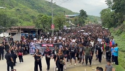 People from the Kuki-Zo community hit the streets of Kangpokpi on Sunday demanding the release of the 14 individuals.