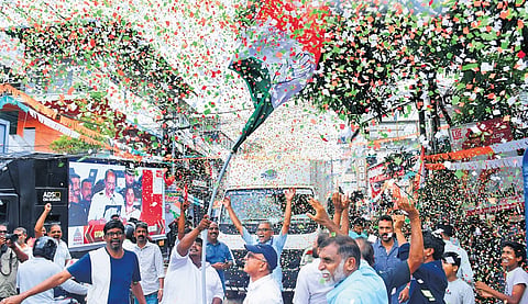 Congress workers at Karukappally celebrate after V D Satheesan was sworn in as the 13th Chief Minister of Kerala on Monday.