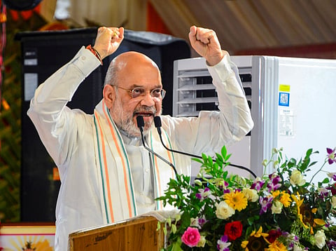 Union Home Minister Amit Shah addresses the gathering during the 'Ujar Bastar' programme under the 'Changing Bastar Ki Nayi Pehchan' initiative, in Jagdalpur, Bastar district, Chhattisgarh, Monday, May 18, 2026.
