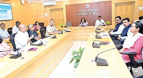 Odisha state chief secretary Anu Garg addressing a meeting with higher officials