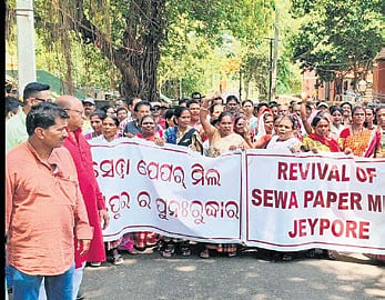 Members of trade unions staging protest in front of Koraput collectorate