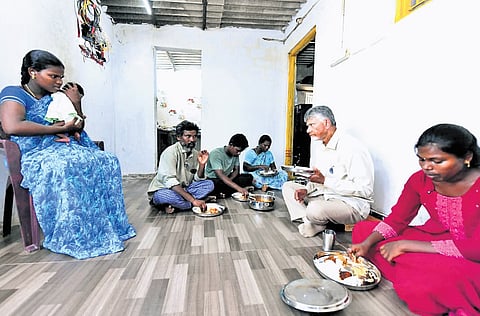 Chief Minister Nara Chandrababu Naidu having lunch with a fisherman’s family
during his visit to Kavali in Nellore district on Tuesday