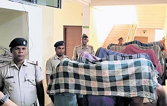 Police along with the accused.