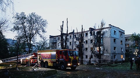 In this photo provided by the Ukrainian Emergency Services on Monday, May 18, 2026, a residential building is seen damaged after a Russian strike on Dnipro, Ukraine.