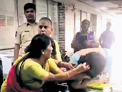 A screen grab of a video of
J Boyamma, mother-in-law of former Hyderabad mayor Bonthu Rammohan, allegedly attacking a women’s hostel staffer at Ameerpet