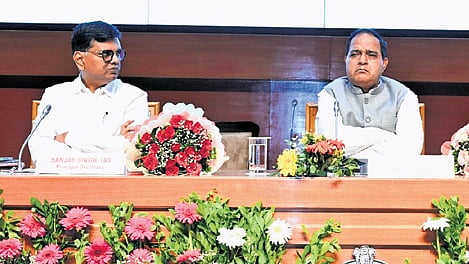 Minister KC Patra, principal secy Sanjay Singh at the conference