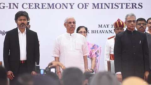 (L to R) Tamil Nadu Chief Minister C Joseph Vijay, Governor Rajendra Arlekar and Chief Secretary Sai Kumar during the swearing-in ceremony of ministers at Lok Bhavan in Chennai, Thursday, May 21, 2026.