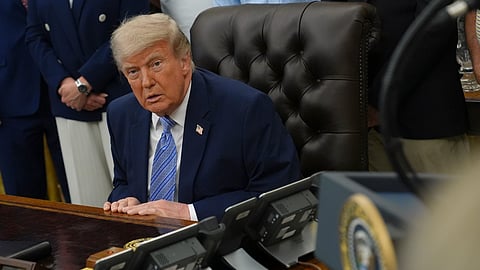 US President Donald Trump attends an event in the Oval Office at the White House, Thursday, May 21, 2026, in Washington.