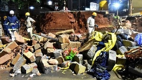 The spot where a compound wall collapsed and seven people died near Bowring Hospital due to heavy rain in Bengaluru.