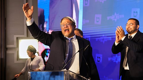 Israeli far-right lawmaker Itamar Ben-Gvir gestures after election exit poll results are released at his party's headquarters in Jerusalem on Nov. 2, 2022.