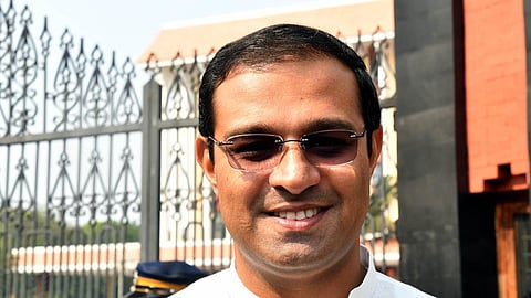 Minister Roji M John