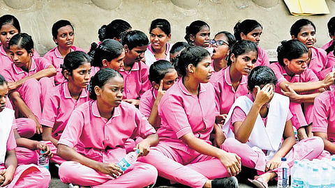 Students protesting against classmate Seethalakshmi’s death, in front of the Mahatma Gandhi Memorial Government Hospital on Saturday