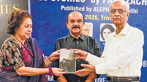 Poet K Jayakumar(R) releases the English translation of Paul Zachariah’s 50 stories, by handing over a copy to writer Rose at Trivandrum Club on Saturday