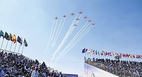 Surya Kiran display during the inaugural day of Aero India at Yelahanka Air Force Station in Bengaluru.
