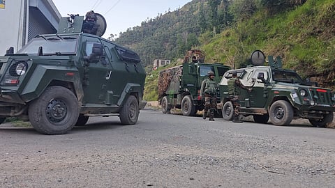 Security personnel during a cordon-and-search operation after an encounter broke out between security forces and terrorists on Saturday, in the Gambhir Mughlan area, Rajouri district, Jammu and Kashmir, Sunday, May 24, 2026.