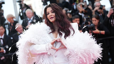 Aishwarya Rai Bachchan poses for photographers upon arrival at the awards ceremony during the 79th international film festival, Cannes, southern France, Saturday, May 23, 2026.