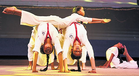 Students perform yoga during the valedictory programme of ‘Samskaar 2026’ at Ramakrishna Math in Hyderabad on Sunday.