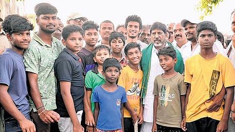 Deputy Chief Minister Mallu Bhatti Vikramarka with children during his visit to his Assembly constituency, Madhira, on Sunday.