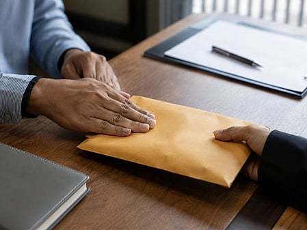 Vigilance sleuths caught a panchayat executive officer (PEO) red-handed while he was allegedly taking `5,000 bribe from a widow.