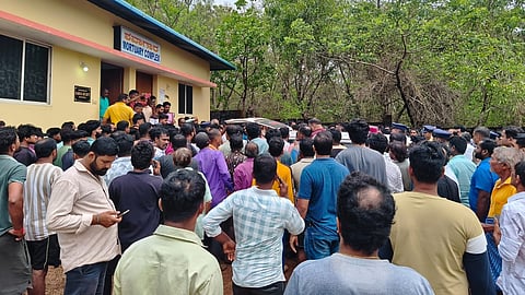 People gather at the Bhatkal Government Hospital mortuary after hearing about the drowning at Shirali Tattehakklu on Sunday.