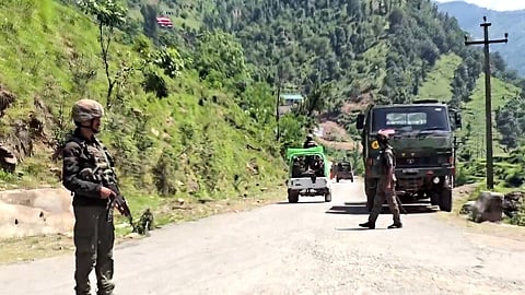 Security personnel intensify vigil and seal border areas during an anti-terror operation following an encounter, in Rajouri district, Jammu and Kashmir, Monday, May 25, 2026.