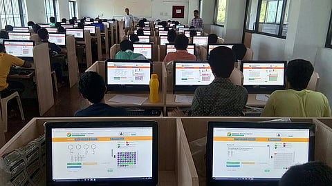The K Radhakrishnan committee recommended a computer-assisted pen-and-paper test model. In this hybrid system, CBT-like processes would be used until encrypted question papers reach confidential servers at testing centres