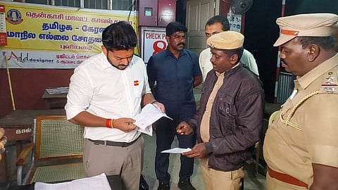 Minister Dr T K Prabhu conducting a surprise inspection early on Monday at the checkpost in Puliyarai.