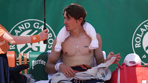 Alex De Minaur of Australia attends a break during the first round men's singles match against Toby Samuel of Britain at the French Open tennis tournament in Paris, Monday, May 25, 2026.