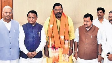 Debashish Samantaray being greeted by BJP national president Nitin Nabin, CM Mohan Majhi, Union ministers Jual Oram and Dharmendra Pradhan in New Delhi