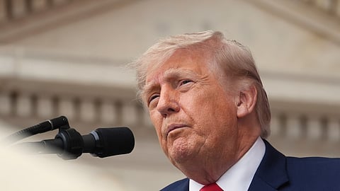 President Donald Trump speaks during the 158th National Memorial Day Observance coinciding with the nation's 250th anniversary, at the Memorial Amphitheater in Arlington National Cemetery, Monday, May 25, 2026, in Arlington, Va.