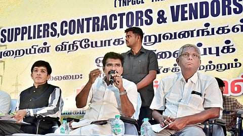 Energy Resources and Law Minister R Nirmalkumar speaks reacts at the coordination meeting held with TANGEDCO suppliers, contractors and vendors', held in Chennai on Monday. TNEB Chairman Dr J. Radhakrishnan (L) look on.
