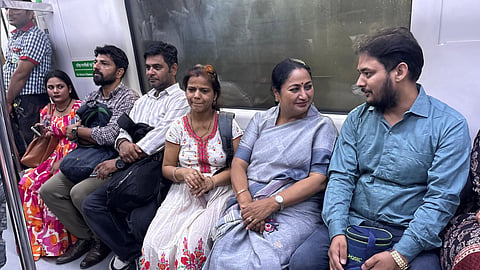 CM Rekha Gupta during a Metro ride on her way to the Delhi Secretariat on Monday