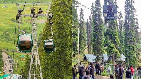 Tourists remain stranded after the Gulmarg Gondola cable car service was temporarily halted due to a technical fault, in Baramulla district of Jammu and Kashmir on Monday, May 25, 2026.