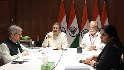 Education Minister Dharmendra Pradhan with High Powered Committee Chairman K Radhakrishnan reviewing re-xam of NEET-UG in Delhi on Wednesday.