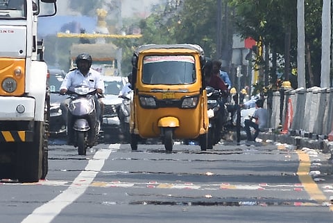 Motorists navigate through shimmering mirages on Kamarajar Salai as Chennai reels under scorching summer heat and intense heatwave conditions on Wedensday.