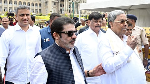 CM Siddaramaiah, flanked by ministers BZ Zameer Ahmed Khan and HC Mahadevappa and CM’s legal advisor AS Ponnanna, leave Vidhana Soudha after paying tribute to former PM Jawaharlal Nehru on his death anniversary on Wednesday.