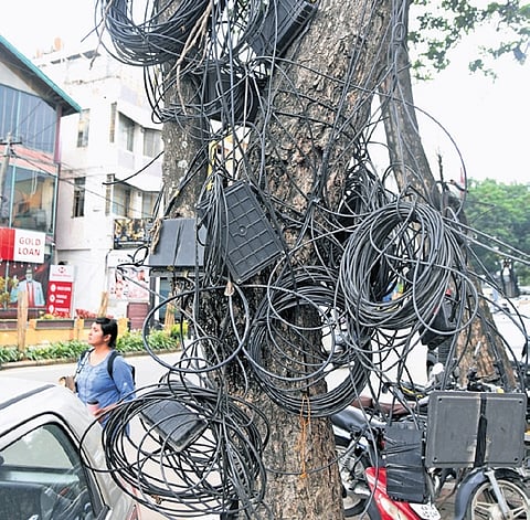 Citizens, activists and urban experts warn that loose wires, crumbling infrastructure and poor coordination are turning parts of the city into death traps.