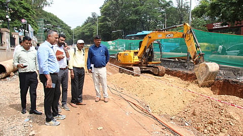Greater Bengaluru Authority Chief Commissioner M Maheshwar Rao inspects work at the Wind Tunnel Road junction on Old Airport Road on Wednesday.