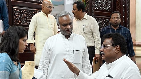 Ministers MB Patil and Priyank Kharge at Vidhana Soudha after a cabinet meeting in Bengaluru.