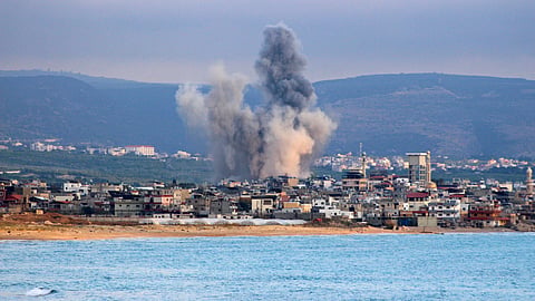 Smoke rises from the site of an Israeli strike near the southern Lebanese city of Tyre on May 27, 2026.