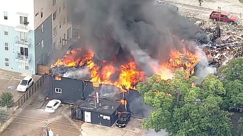 This image made from video provided by KDFW FOX 4 shows a large fire at an apartment complex in Dallas, Thursday, May 28, 2026.