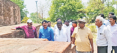 A team of senior officials and archaeology experts, led by Telangana Heritage Department Director Professor Arjun Rao Kuthadi, inspects the mahastupa