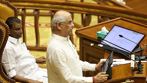 Governor Rajendra Viswanatha Arlekar delivers the policy address in the Assembly on Friday.Speaker Thiruvanchoor Radhakrishnan is also seen.