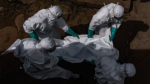 Workers from the Uganda Red Cross Society evacuate the body of a suspected Ebola victim in Kampala on May 26, 2026.